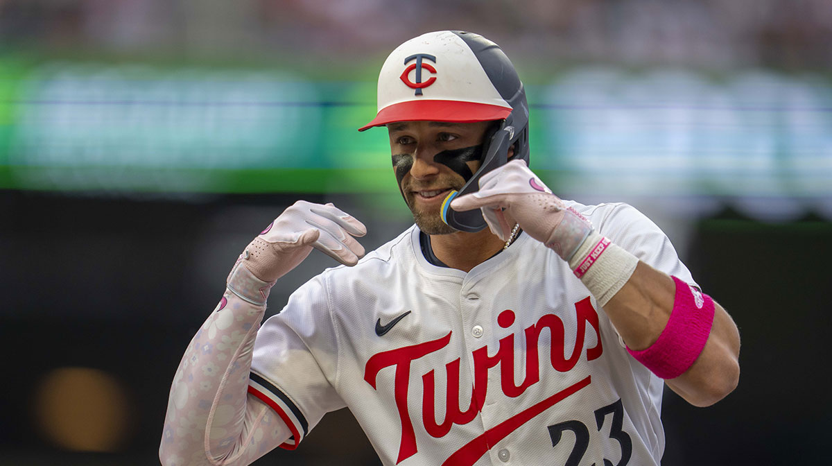 Minnesota Twins third baseman Royce Lewis (23) celebrates after hitting an RBI single against the Texas Rangers in the fourth inning at Target Field.