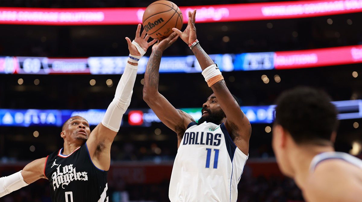 Dallas Mavericks guard Kyrie Irving (11) shoots the ball over Los Angeles Clippers guard Russell Westbrook (0) during the third quarter of game two of the first round for the 2024 NBA playoffs at Crypto.com Arena.