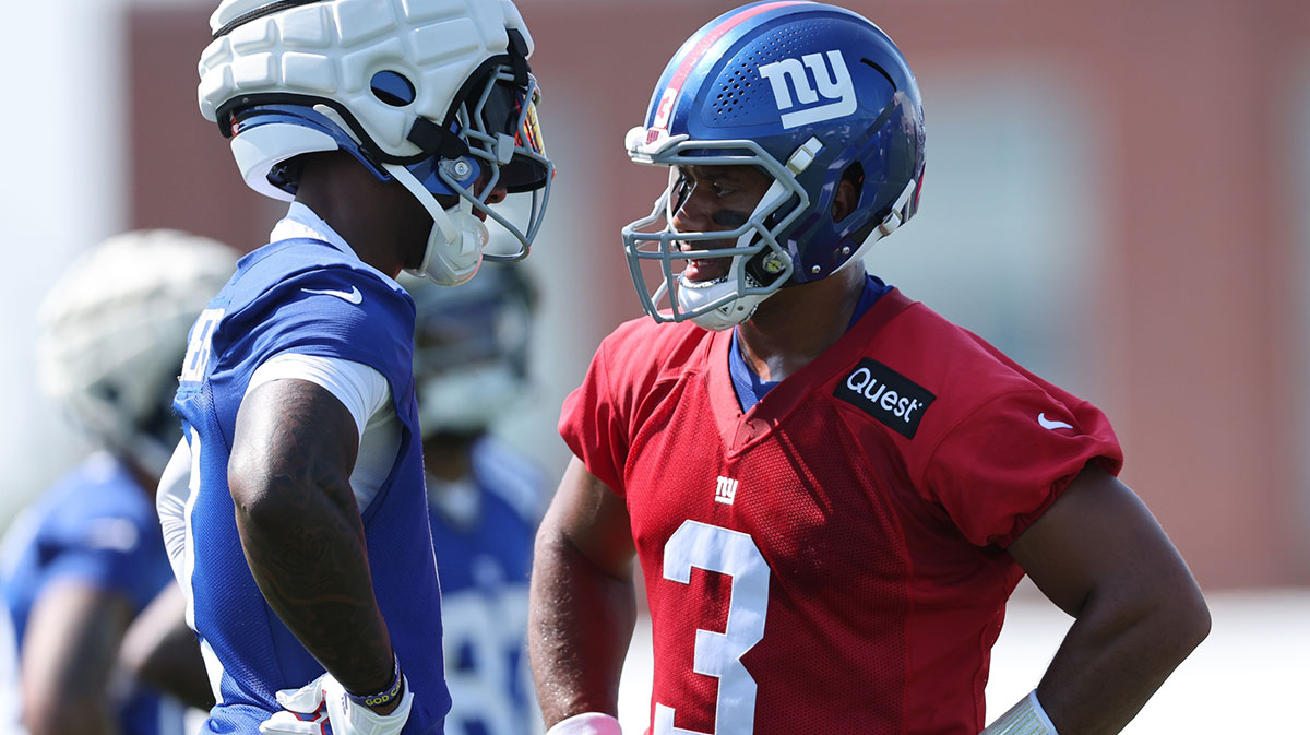 New York Giants quarterback Russell Wilson (3) talks with wide receiver Malik Nabers (1) during training camp at Quest Diagnostics Training Center.