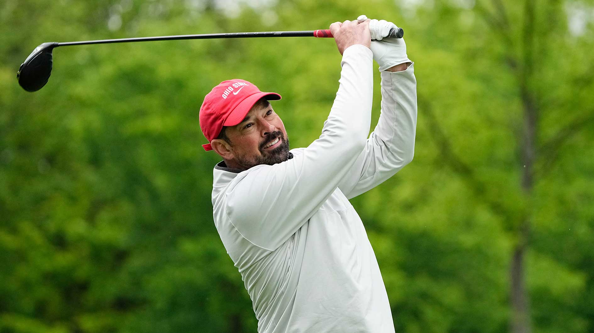Ohio State Buckeyes football head coach Ryan Day tees off on No. 15 during the Workday Golden Bear Pro-Am at Muirfield Village Golf Club.