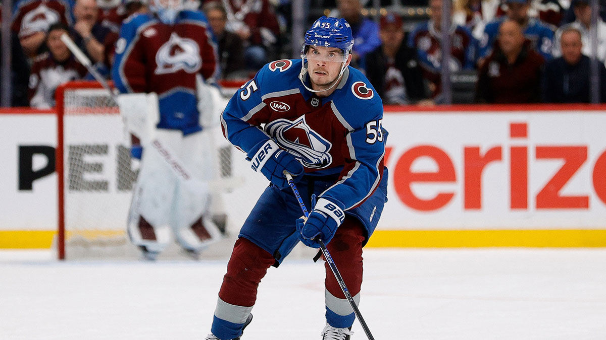 Colorado Avalanche defenseman Ryan Lindgren (55) controls the puck in the second period against the Dallas Stars in game three of the first round of the 2025 Stanley Cup Playoffs at Ball Arena.