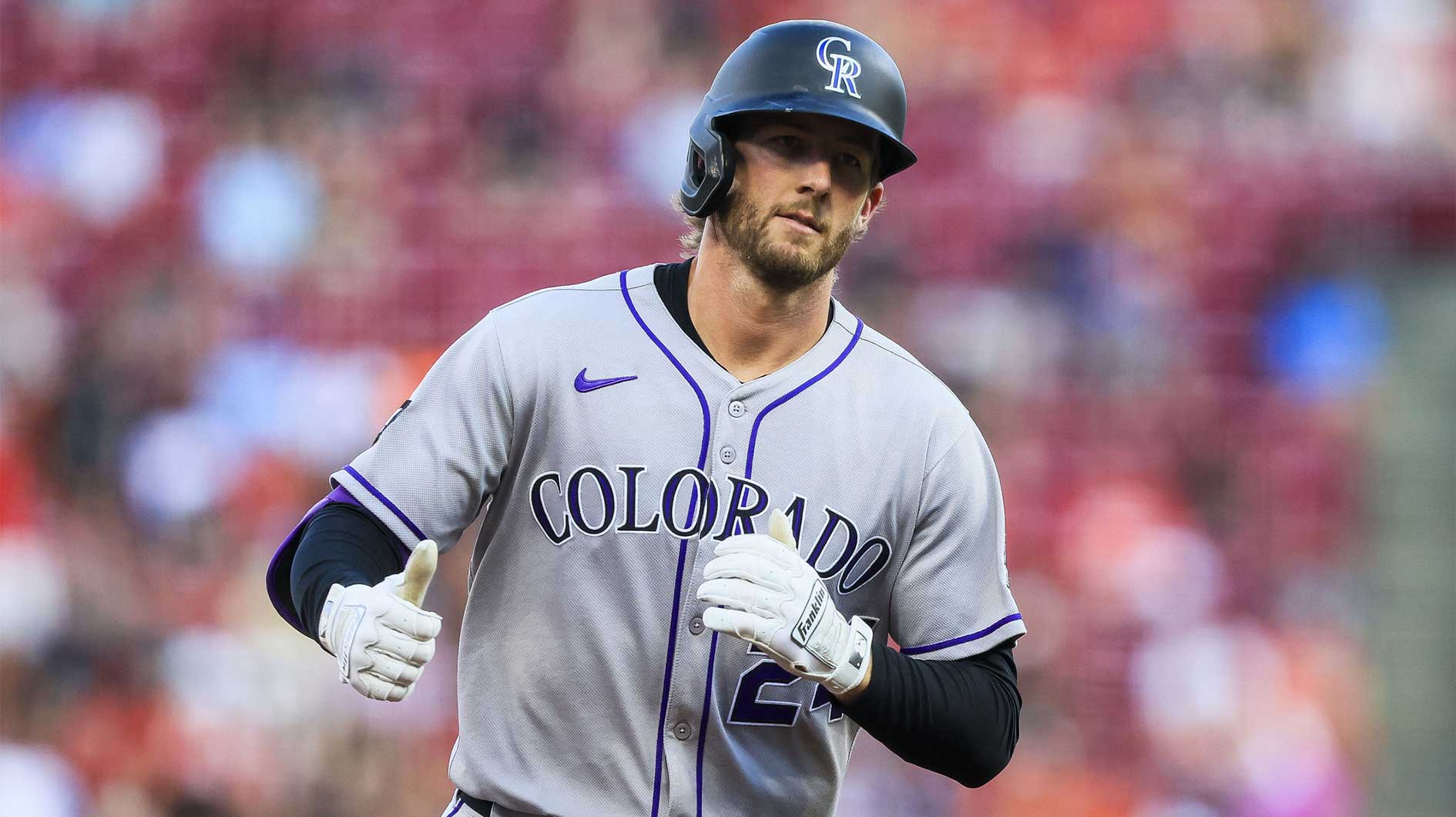 Colorado Rockies third baseman Ryan McMahon (24) reacts after hitting a two-run home run in the fourth inning against the Cincinnati Reds at Great American Ball Park.