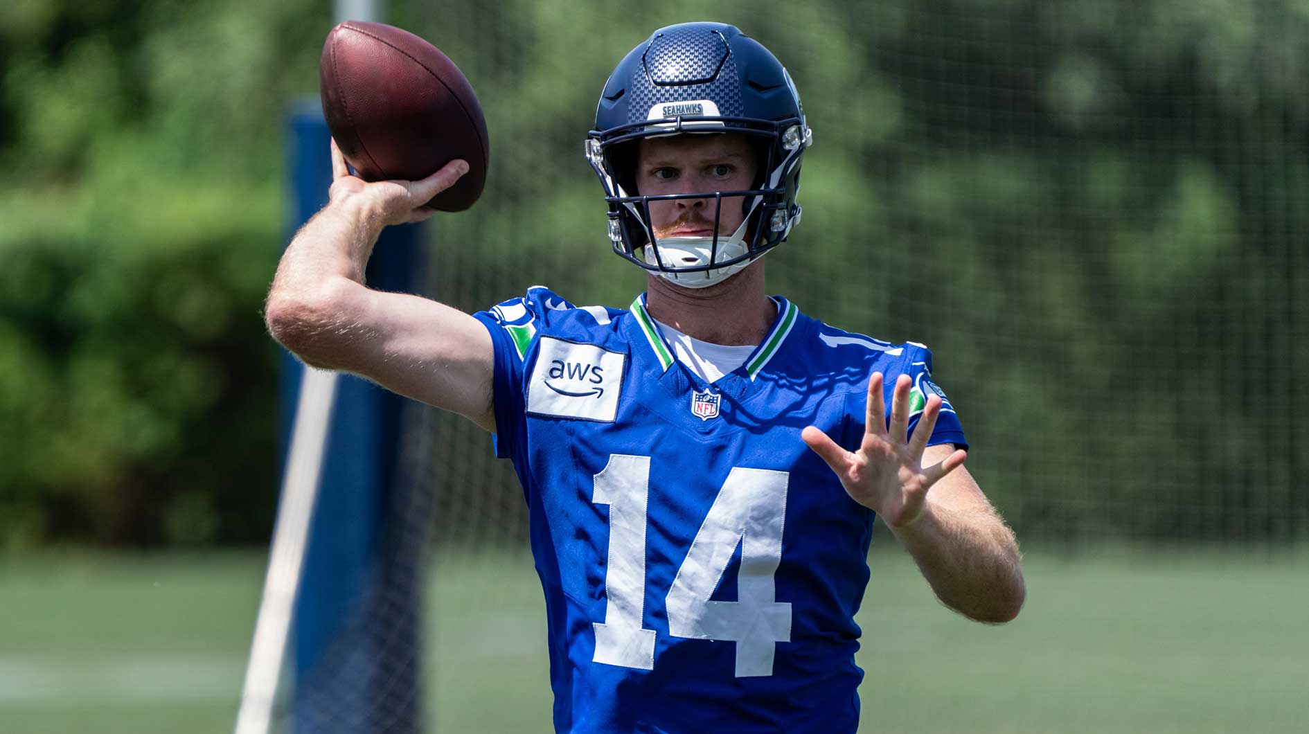 Jun 11, 2025; Renton, WA, USA; Seattle Seahawks quarterback Sam Darnold (14) passes the ball during mini-camp at Virginia Mason Athletic Center.