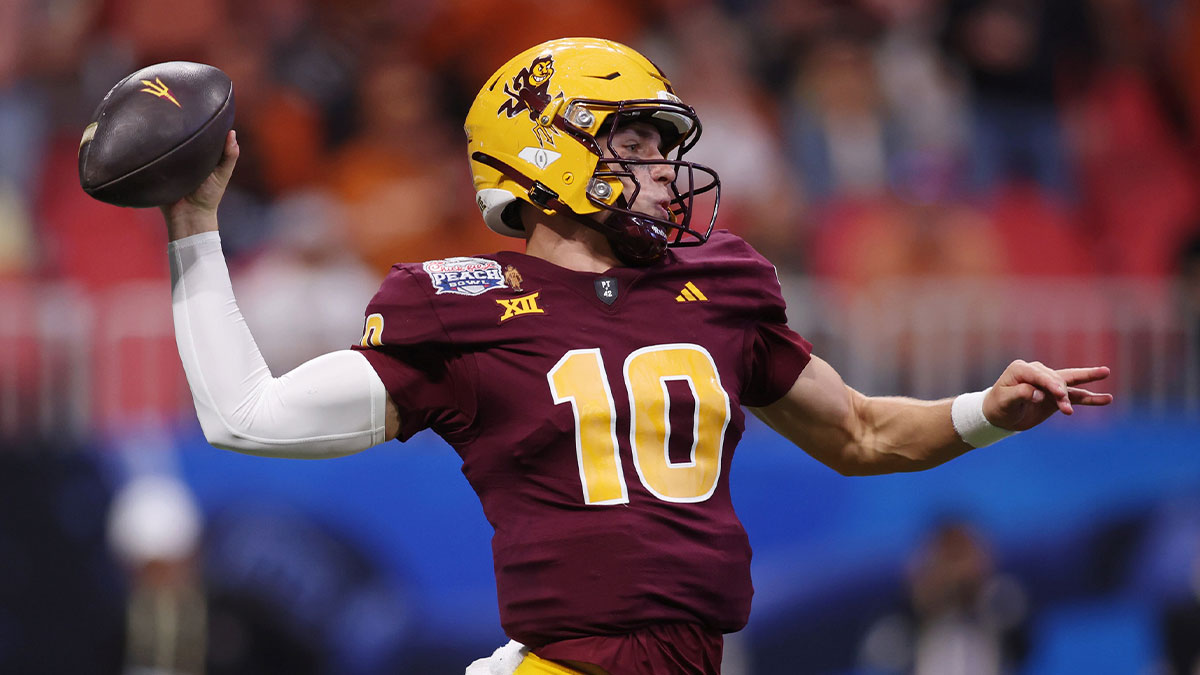 Arizona State Sun Devils quarterback Sam Leavitt (10) passes the ball against the Texas Longhorns during the first half of the Peach Bowl at Mercedes-Benz Stadium.
