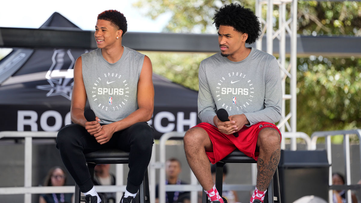 San Antonio first round draft picks Carter Bryant (left) and Dylan Harper answer questions during the Spurs Family Cookout at Victory Capital Performance Center.