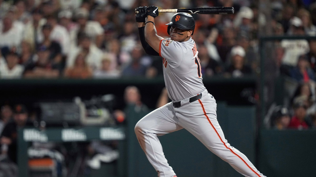San Francisco Giants designated hitter Rafael Devers (16) hits a double against the Athletics during the eighth inning at Sutter Health Park. Flores
