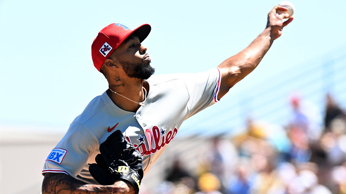 Philadelphia Phillies starting pitcher Christopher Sanchez (61) throws a pitch in the first inning against the Pittsburgh Pirates during spring training at LECOM Park.