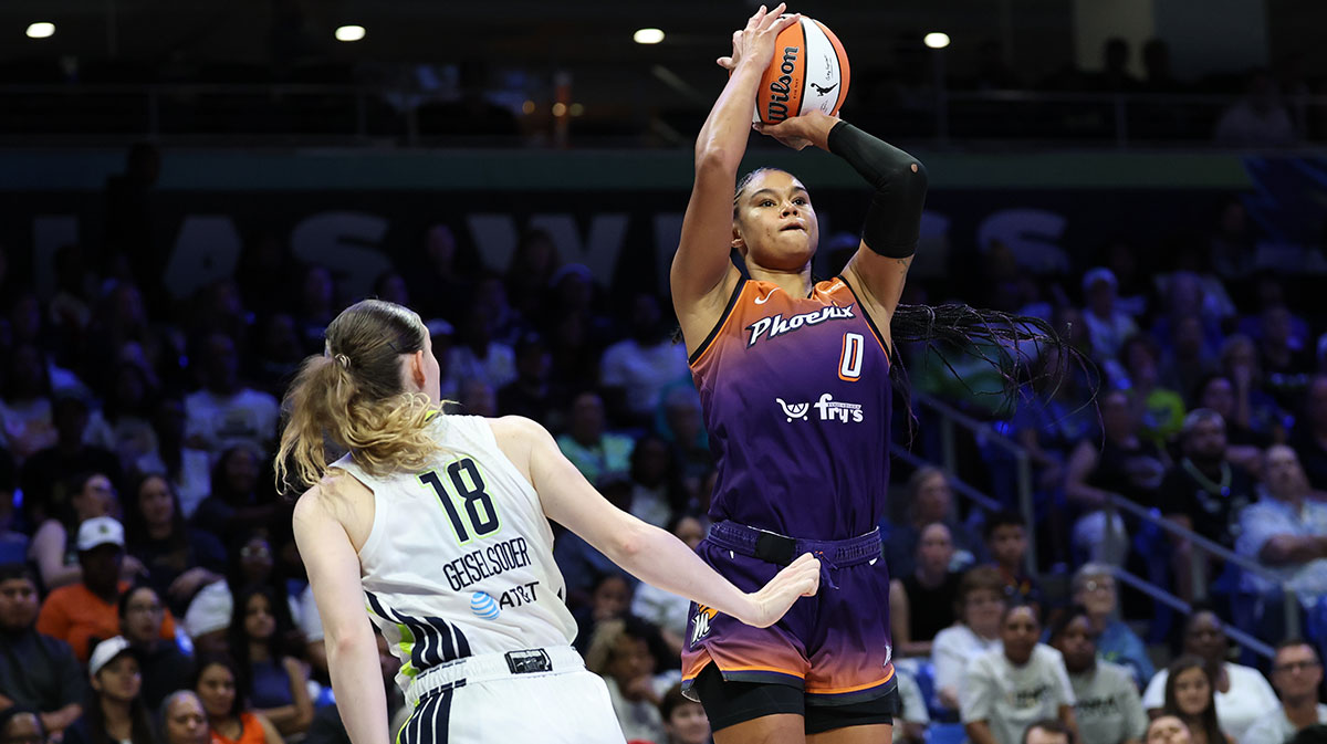 Phoenix Mercury forward Satou Sabally (0) shoots over Dallas Wings center Luisa Geiselsoder (18) during the second half at College Park Center.