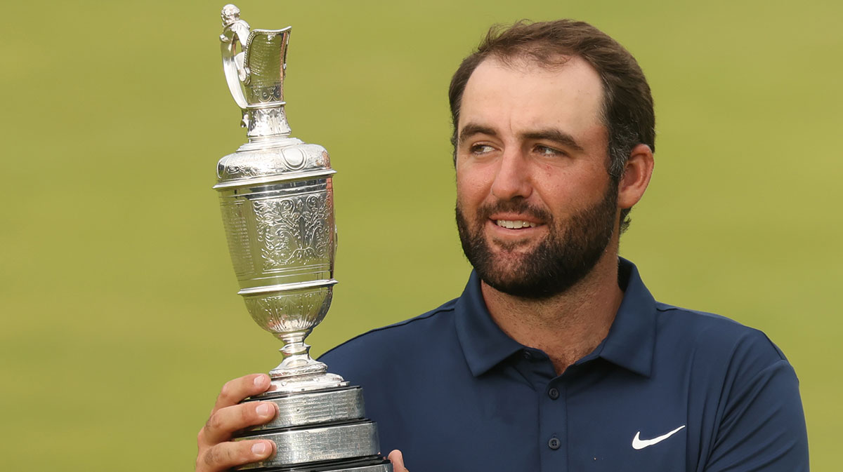 Scottie Scheffler celebrates with the Claret Jug after winning the 153rd Open Championship golf tournament at Royal Portrush