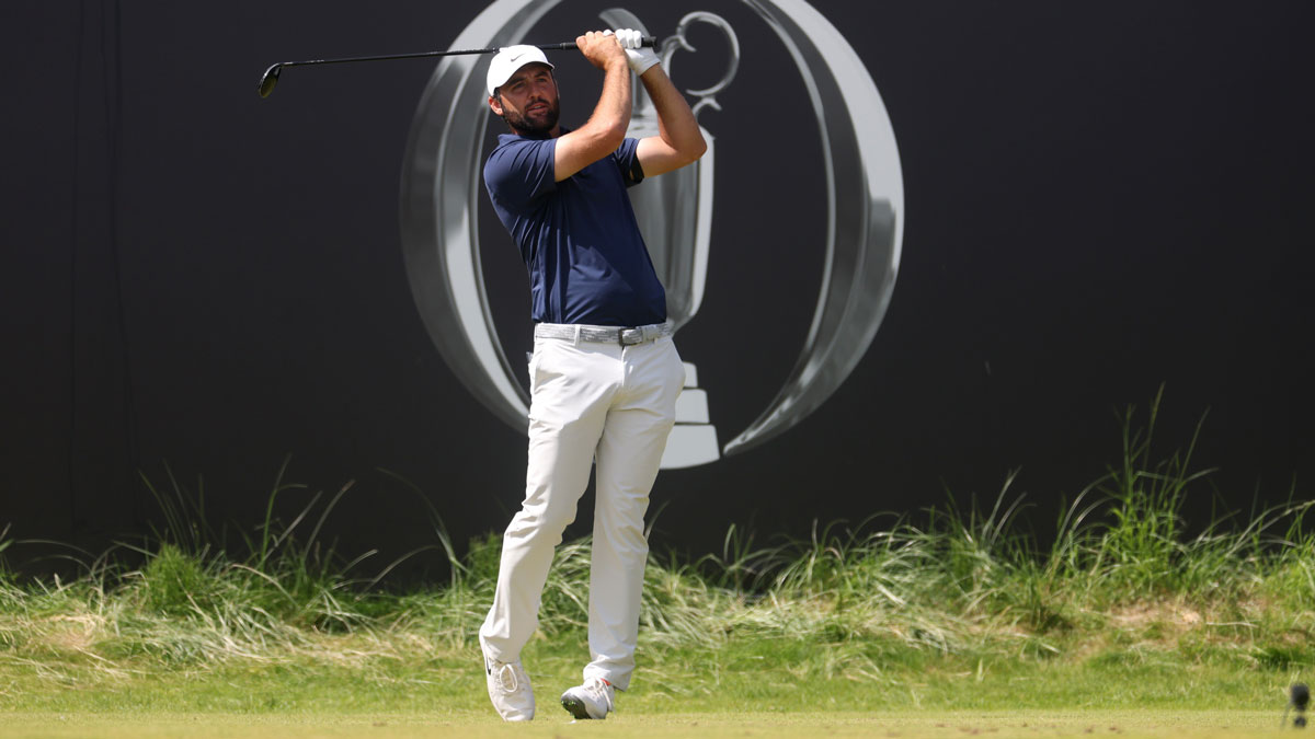 Scottie Scheffler tees off on the first hole during the final round of The 153rd Open Championship golf tournament at Royal Portrush.