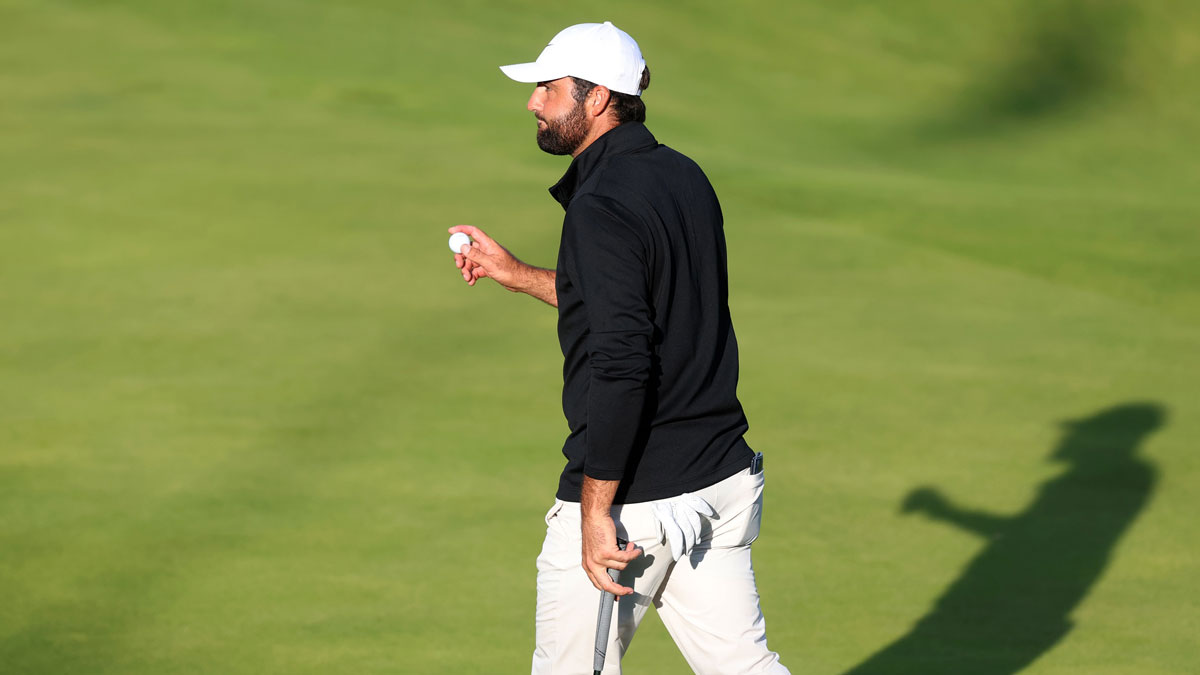 Scottie Scheffler tees off on the first hole during the final round of The 153rd Open Championship golf tournament at Royal Portrush. 