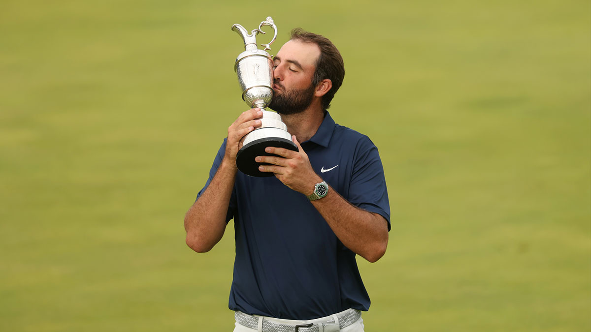Scottie Scheffler celebrates with the Claret Jug after winning the 153rd Open Championship golf tournament at Royal Portrush.
