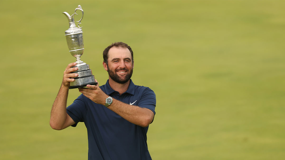 Scottie Scheffler celebrates with the Claret Jug after winning the 153rd Open Championship golf tournament at Royal Portrush.