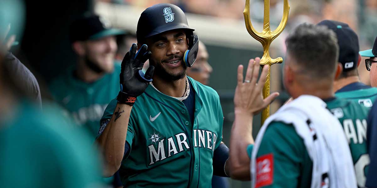 Seattle Mariners center fielder Julio Rodríguez (44) celebrates in the dugout after hitting a two-run home run off Detroit Tigers starting pitcher Tarik Skubal (not pictured) in the fifth inning at Comerica Park.