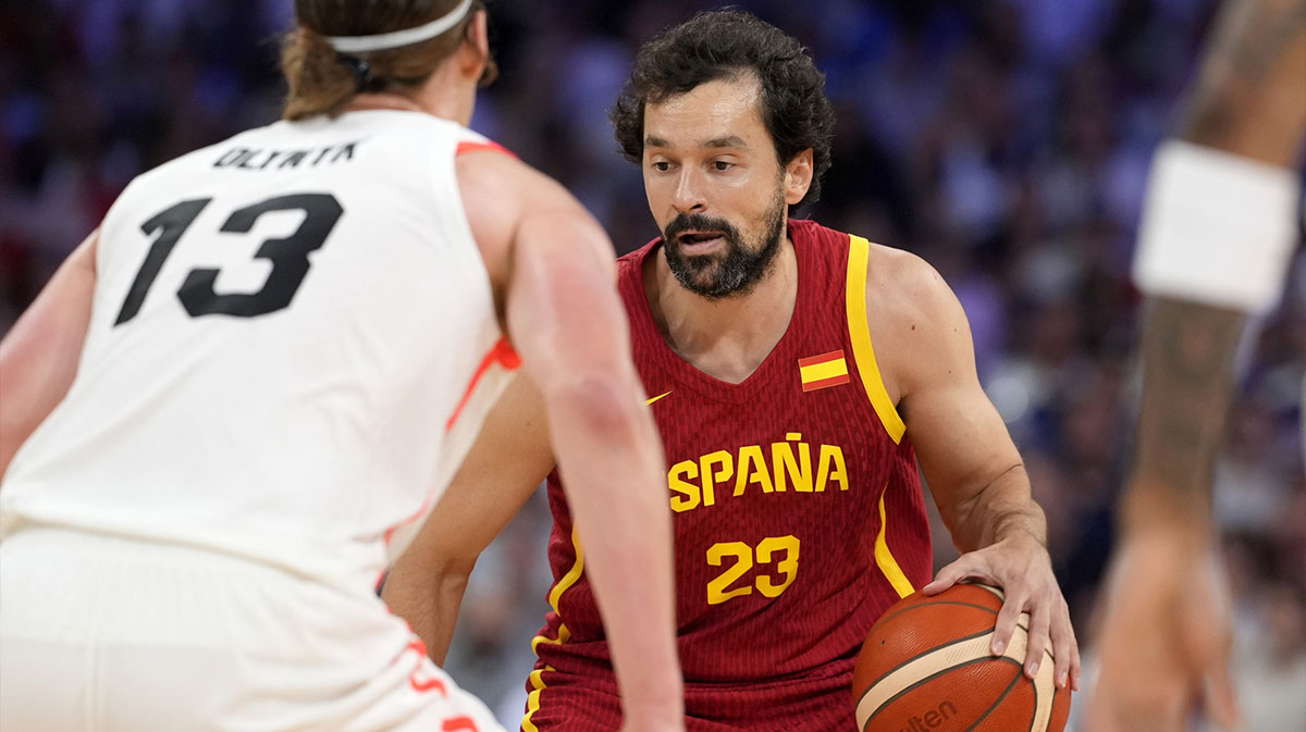 Spain guard Sergio Llull (23) controls the ball against Canada forward Kelly Olynyk (13) in the first half in a men’s group A basketball game during the Paris 2024 Olympic Summer Games at Stade Pierre-Mauroy.