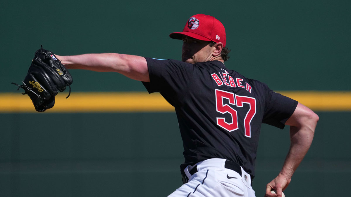 Mar 2, 2024; Goodyear, Arizona, USA; Cleveland Guardians starting pitcher Shane Bieber (57) pitches against the Kansas City Royals during the first inning at Goodyear Ballpark. Mandatory Credit: Joe Camporeale-Imagn Images