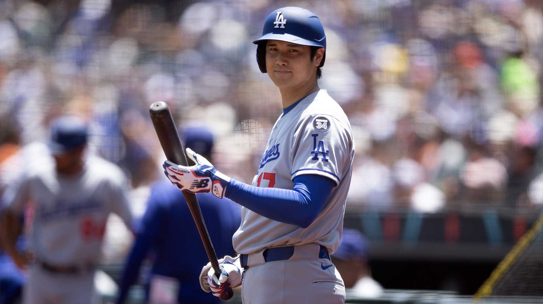 Los Angeles Dodgers designated hitter Shohei Ohtani (17) awaits his turn at bat against the San Francisco Giants during the first inning at Oracle Park.