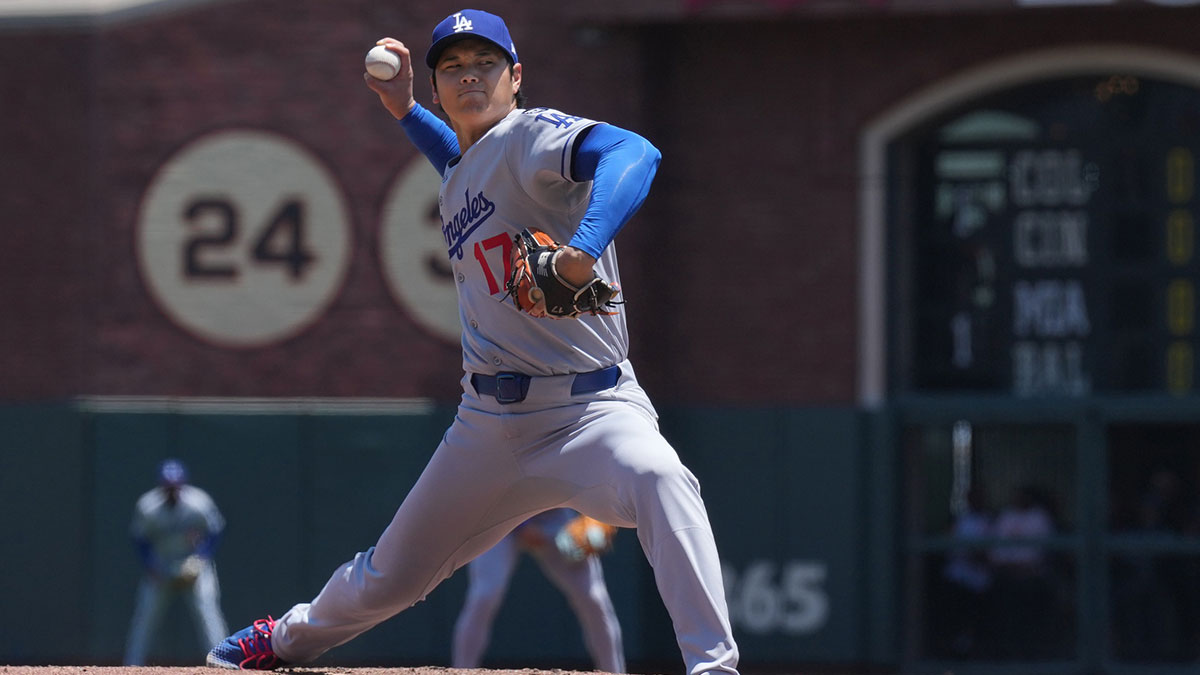 Los Angeles Dodgers starting pitcher Shohei Ohtani (17) throws a pitch against the San Francisco Giants during the third inning at Oracle Park.