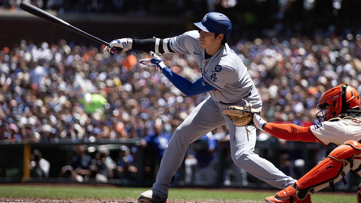 Los Angeles Dodgers designated hitter Shohei Ohtani (17) follows through on his single against the San Francisco Giants during the fifth inning at Oracle Park.