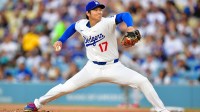 Los Angeles Dodgers starting pitcher Shohei Ohtani (17) throws against the Minnesota Twins during the second inning at Dodger Stadium.