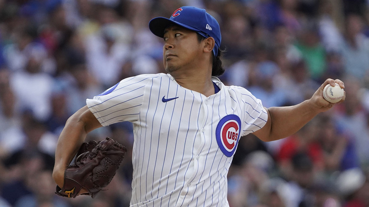 Michael Busch celebrates Cubs ace Shota Imanaga after impressive showing vs. Red Sox