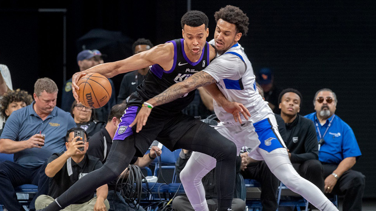 Stockton King’s Skal Labissiere, left, drives on Osceola Magic’s Alex Morales during game 2 of the NBA G League final against the Osceola Magic at the Adventist Health Arena in downtown Stockton on Apr. 11, 2025. The Kings won 144 to 126.