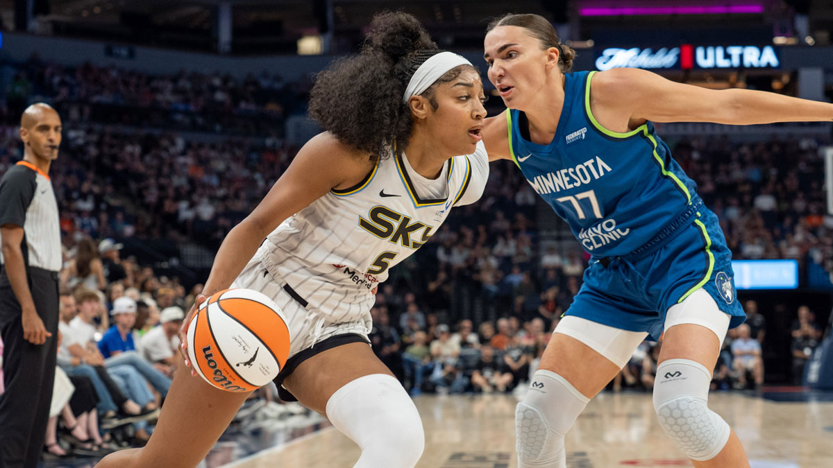Chicago Sky forward Angel Reese (5) drives on Minnesota Lynx forward Maria Kliundikova (77) in the first second at Target Center.