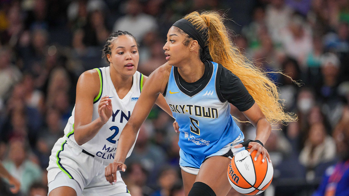 Chicago Sky forward Angel Reese (5) dribbles against the Minnesota Lynx forward Napheesa Collier (24) in the fourth quarter at Target Center.