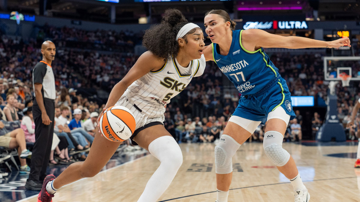 Chicago Sky forward Angel Reese (5) drives on Minnesota Lynx forward Maria Kliundikova (77) in the first second at Target Center.