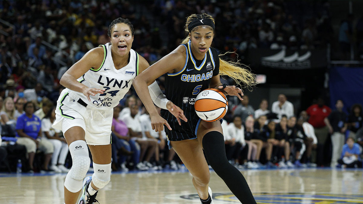 Chicago Sky forward Angel Reese drives to the basket against Minnesota Lynx forward Napheesa Collier during the second half of a WNBA game at Wintrust Arena.