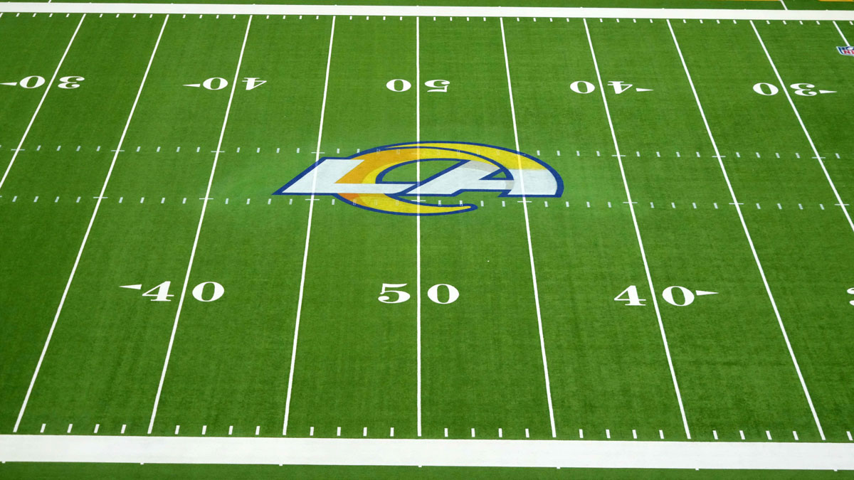 The Los Angeles Rams logo at midfield at SoFi Stadium.