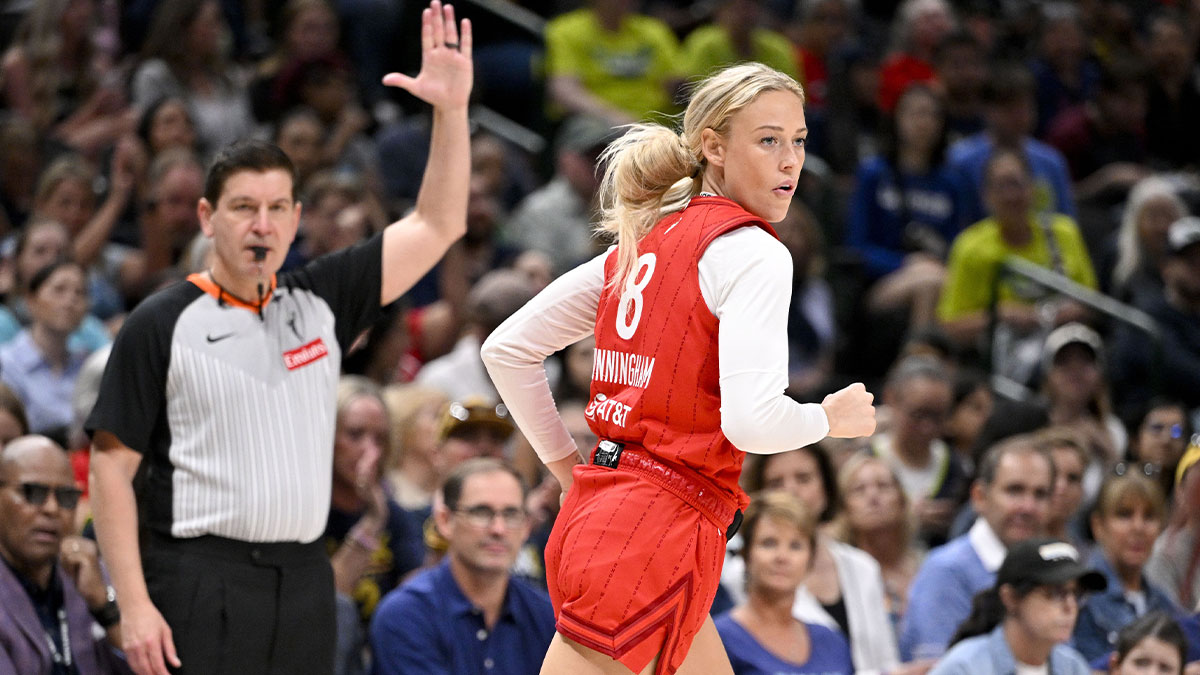 Indiana Fever guard Sophie Cunningham (8) makes a three point basket against the Dallas Wings during the second half at the American Airlines Center.