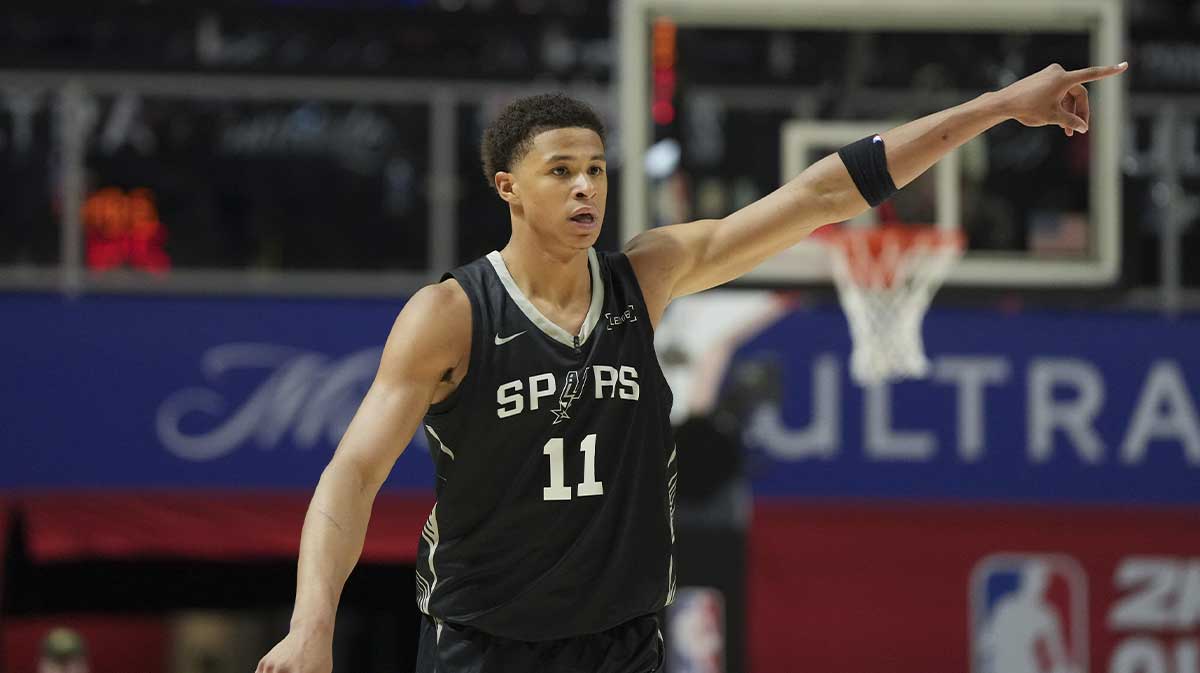 San Antonio Spurs forward Carter Bryant (11) reacts to a teammates basket against the Philadelphia 76ers in the fourth quarter of their game at Thomas & Mack Center.