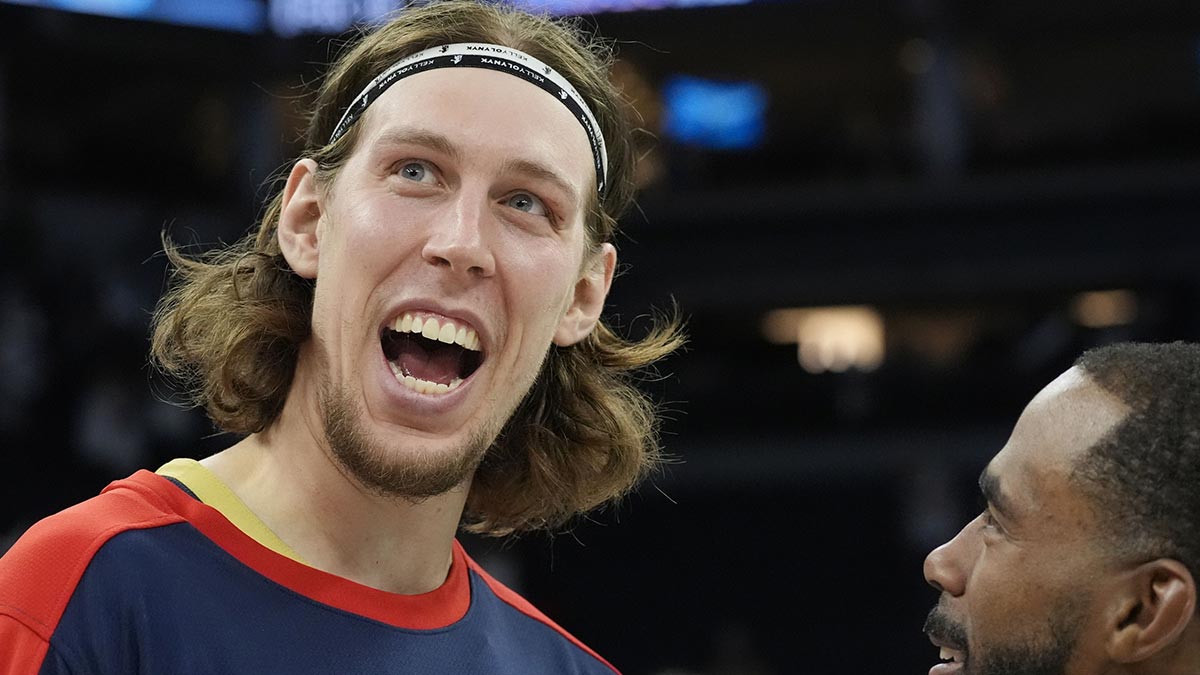 New Orleans Pelicans forward Kelly Olynyk (13) greets Minnesota Timberwolves guard Mike Conley (10) after the game at Target Center.