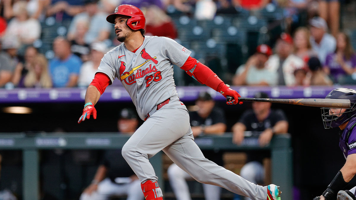 St. Louis Cardinals third baseman Nolan Arenado (28) hits a single in the sixth inning against the Colorado Rockies at Coors Field. MLB