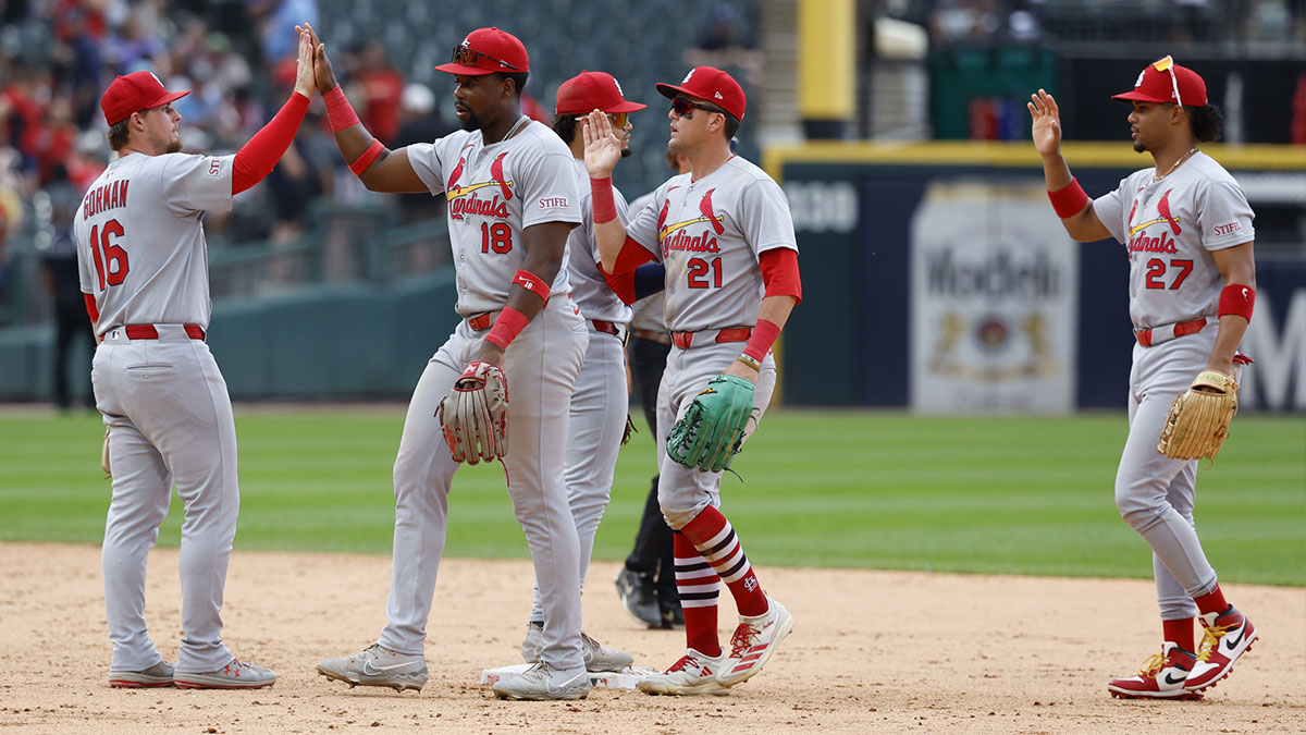 St. Louis Cardinals players celebrate team's win against the Chicago White Sox in a game one of the doubleheader at Rate Field.