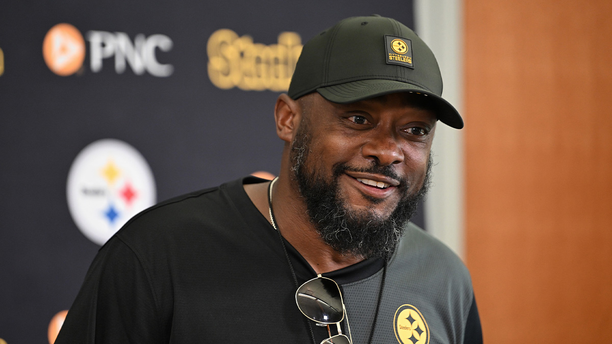 Pittsburgh Steelers head coach Mike Tomlin speaks to the media during training camp at Saint Vincent College .