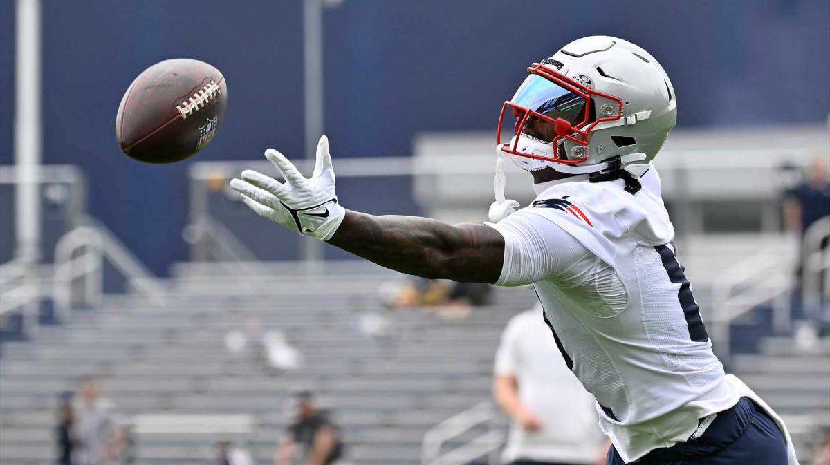 New England Patriots wide receiver Stefon Diggs (8) has the ball sail past his grip during minicamp at Gillette Stadium.