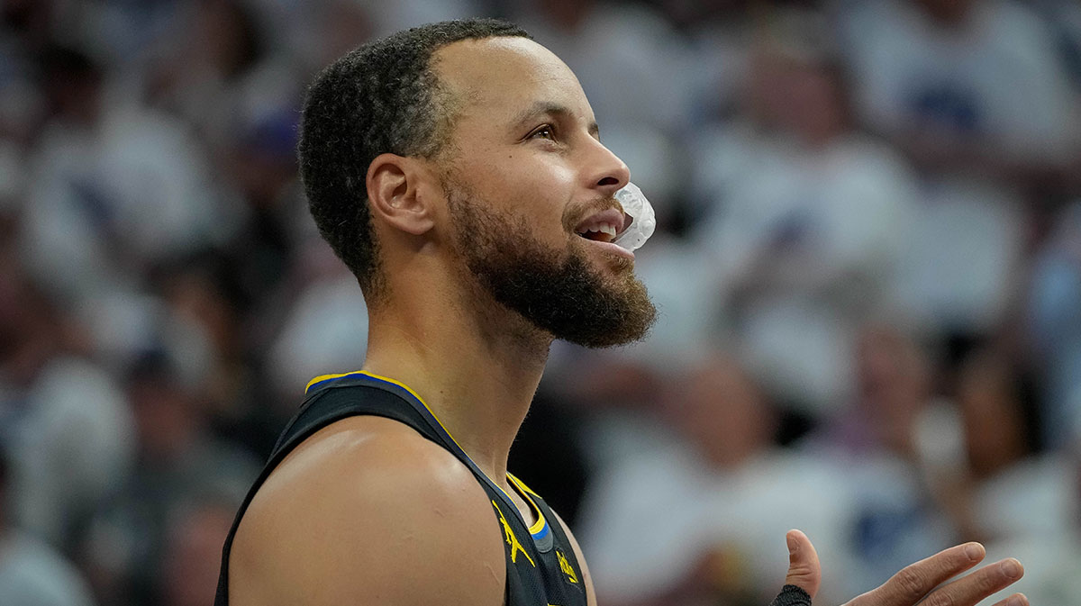 Golden State Warriors guard Stephen Curry (30) prepares to play the Minnesota Timberwolves before game one of the second round for the 2025 NBA Playoffs at Target Center.