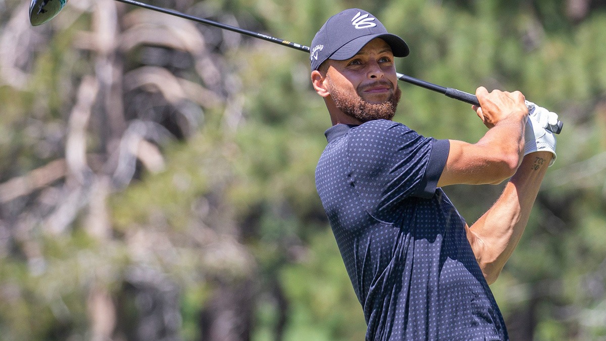 Stephen Curry hits atee shot on the 18th hole during the final round of the American Century Celebrity Championship golf tournament at Edgewood Tahoe Golf Course