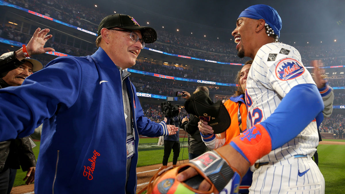 New York Mets owner Steve Cohen celebrates with shortstop Francisco Lindor (12) after defeating the Philadelphia Phillies in game four of the NLDS and winning the series 3 games to 1 during the 2024 MLB Playoffs at Citi Field.