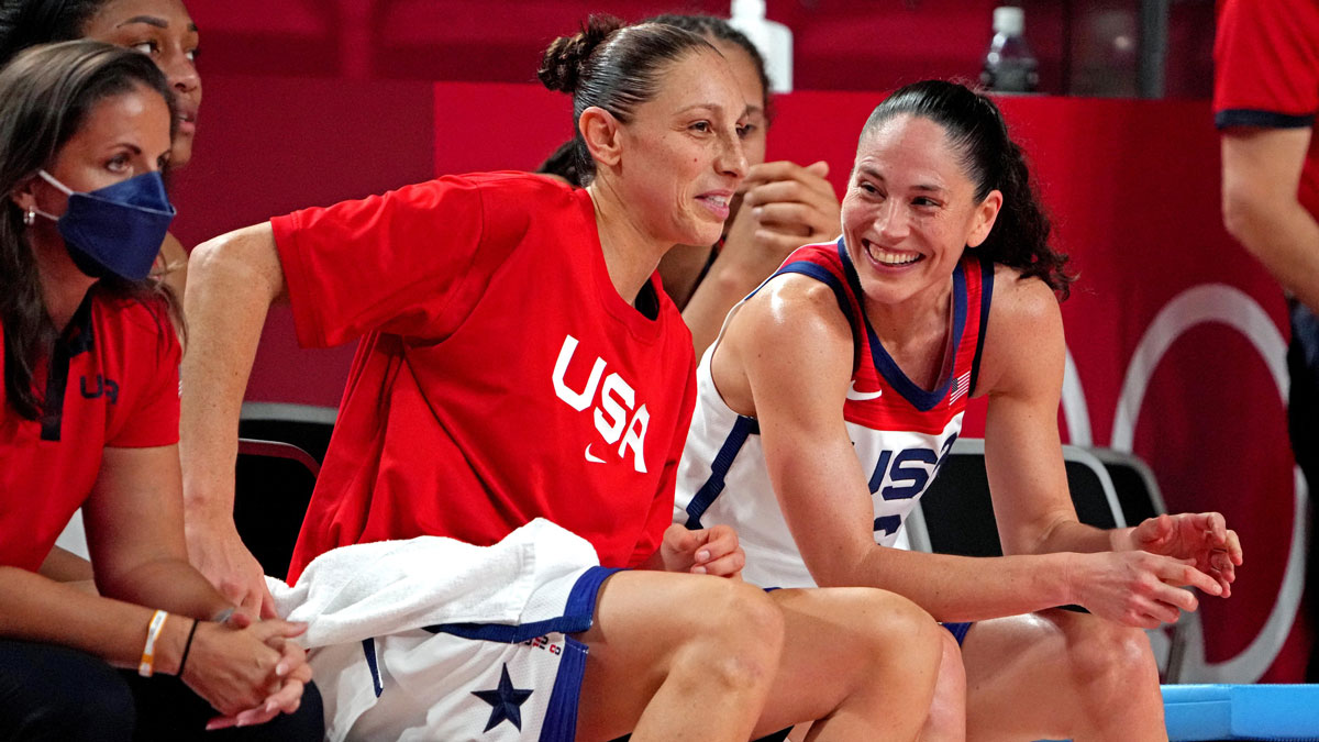 Team USA guard Sue Bird (6) and guard Diana Taurasi (12) talk on the bench in the women's basketball gold medal match during the Tokyo 2020 Olympic Summer Games at Saitama Super Arena.
