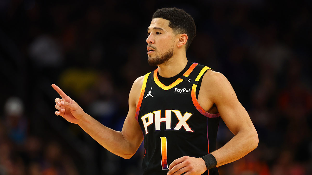 Phoenix Suns guard Devin Booker (1) reacts after a play against the Oklahoma City Thunder during the first half at Footprint Center.