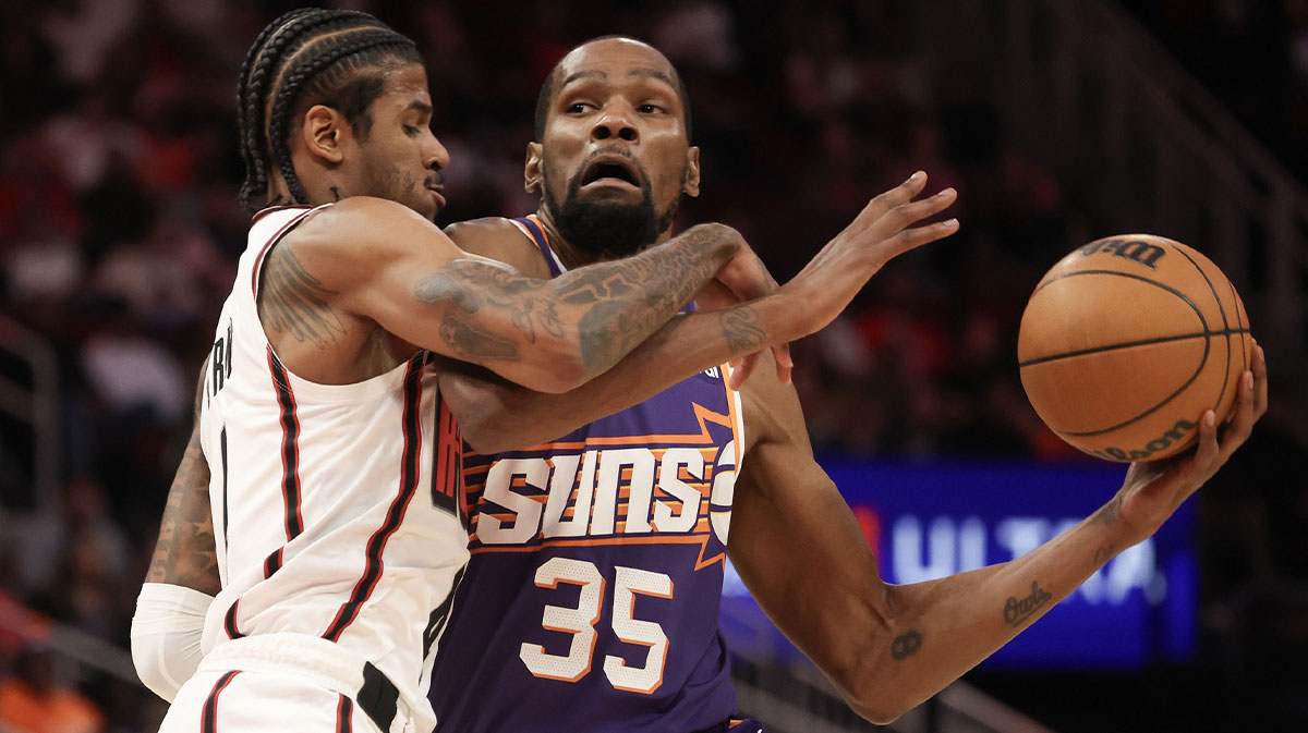 Suns guard Jalen Green defends Rockets' Kevin Durant