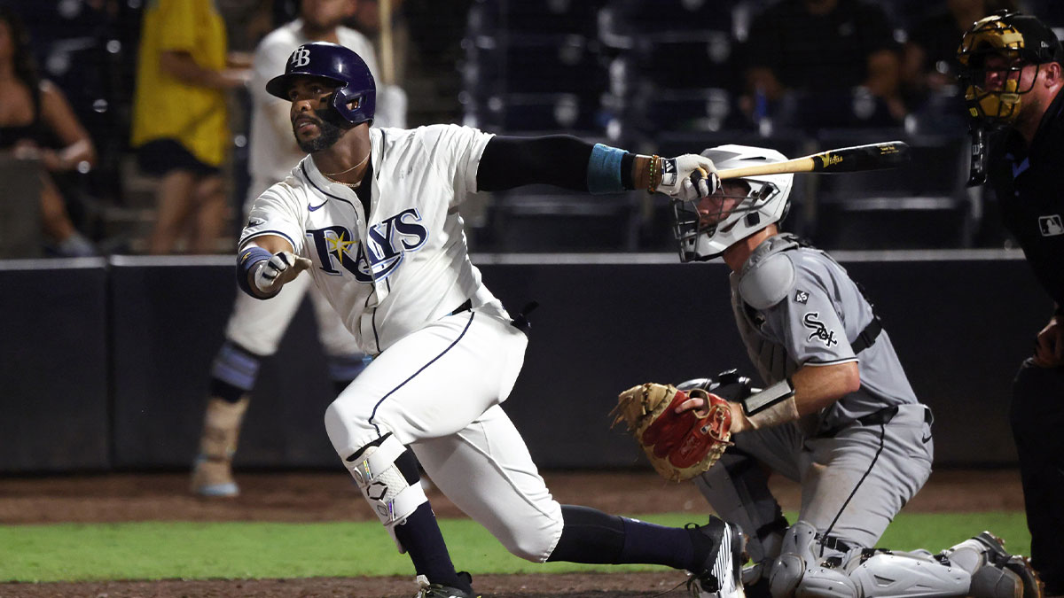 Tampa Bay Rays designated hitter Yandy Diaz (2) hits a home run during the seventh inning against the Chicago White Sox at George M. Steinbrenner Field. MLB