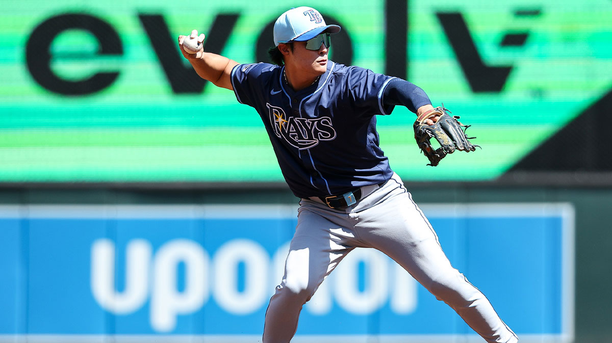 Tampa Bay Rays shortstop Ha-Seong Kim (7) throws the ball to first base to get out Minnesota Twins center fielder Byron Buxton (25) during the first inning at Target Field.