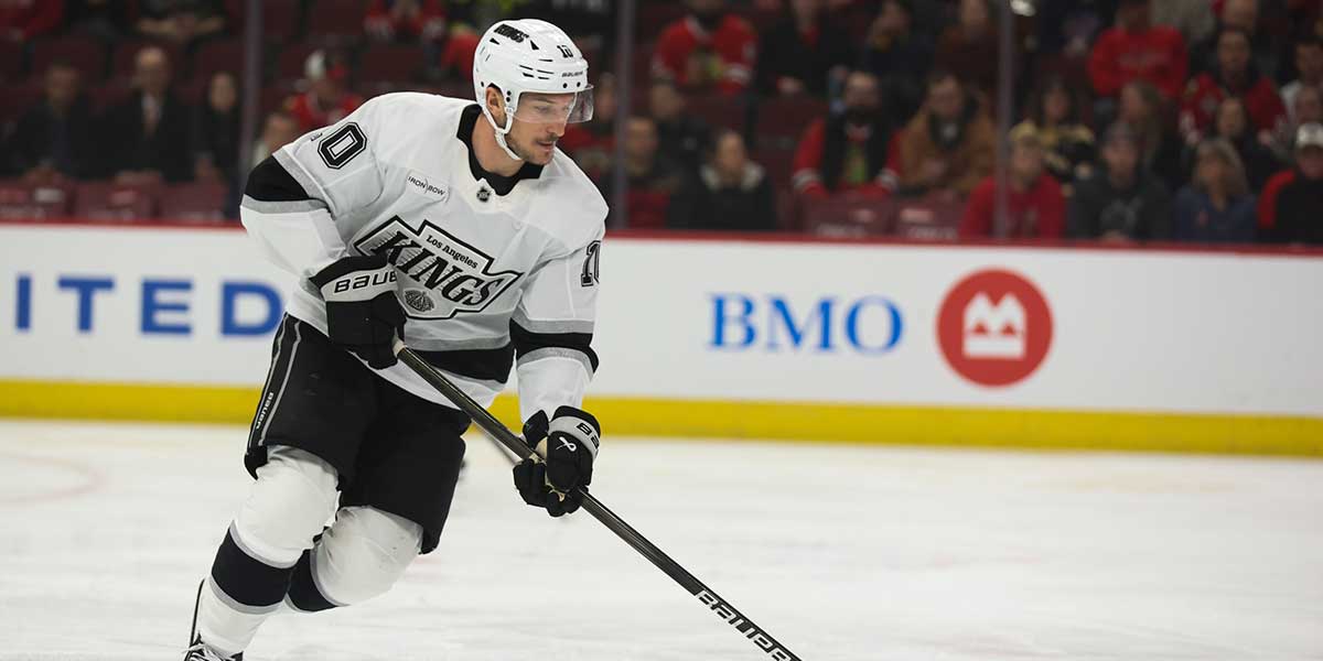 Los Angeles Kings left wing Tanner Jeannot (10) skates with the puck during the first period against the Chicago Blackhawks at United Center.