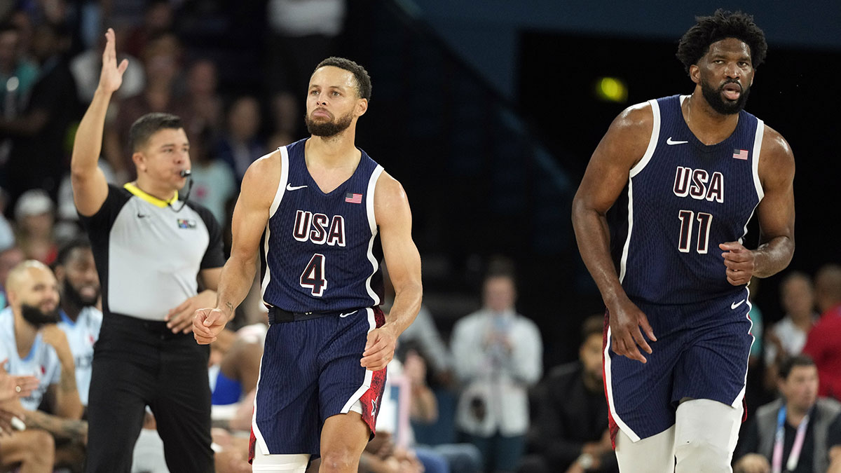 Team USA center Joel Embiid (11) react in the second half against France in the men's basketball gold medal game during the Paris 2024 Olympic Summer Games at Accor Arena