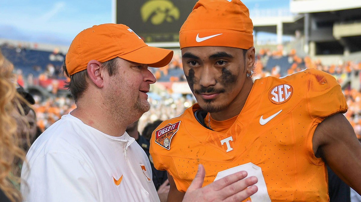 Tennessee head coach Josh Heupel turns to quarterback Nico Iamaleava (8) after their post game interview after winning the Citrus Bowl NCAA College football game on Monday, January 1, 2024.