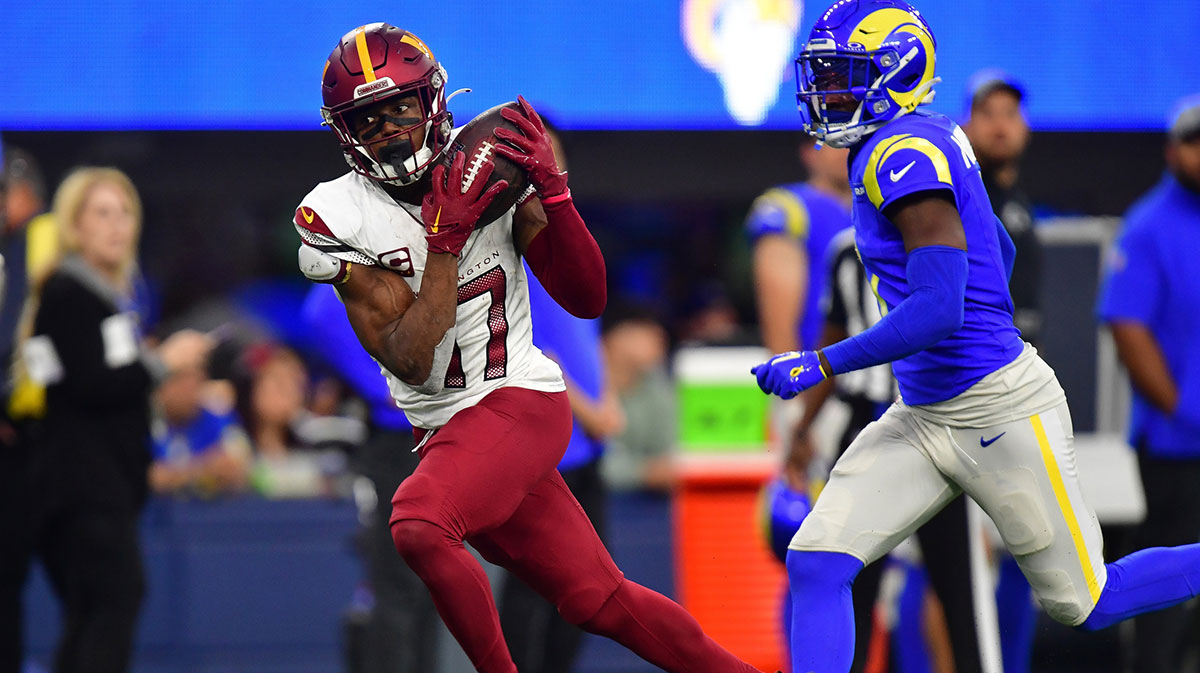 Washington Commanders wide receiver Terry McLaurin (17) catches a pass against the Los Angeles Rams during the second half at SoFi Stadium. Mandatory Credit: Gary A. Vasquez-Imagn Images